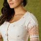 Timeless grace in off-white Jamdani woven blouse.