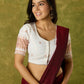 Timeless grace in off-white Jamdani woven blouse.