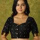 Festive charm in black self-butti cotton silk blouse.