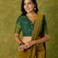 Festive green Jamdani cotton blouse with elegant woven detailing
