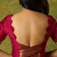 Dark magenta festive blouse with delicate lace highlights.