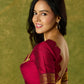 Dark magenta festive blouse with delicate lace highlights.