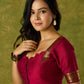 Dark magenta festive blouse with delicate lace highlights.