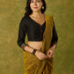 Black cotton silk blouse with intricate Kutch mirror work.