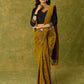 Black cotton silk blouse with intricate Kutch mirror work.