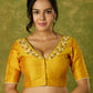 Beautifully hand embroidered light yellow cotton silk blouse for festivals.