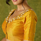 Beautifully hand embroidered light yellow cotton silk blouse for festivals.