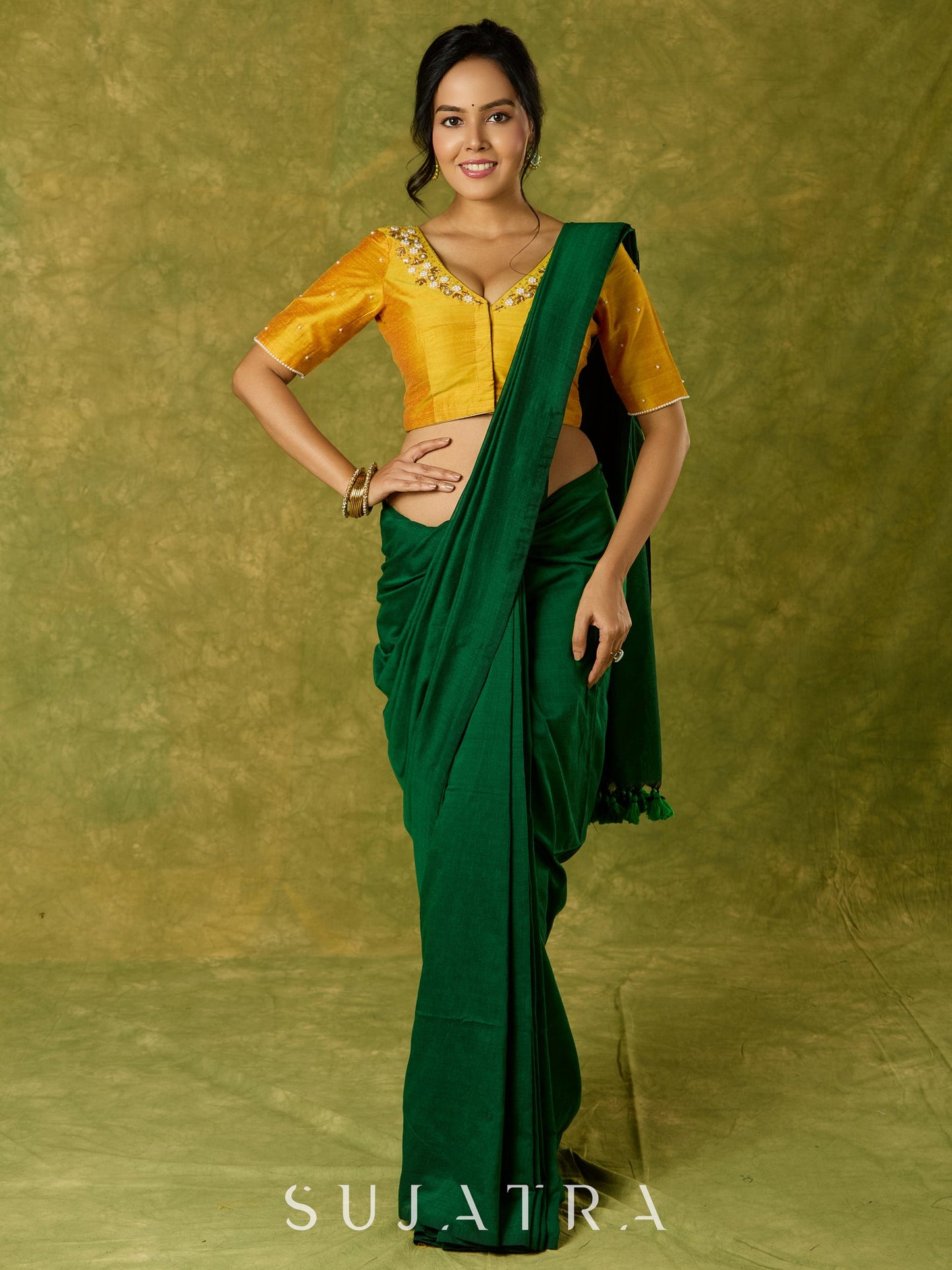 Beautifully hand embroidered light yellow cotton silk blouse for festivals.