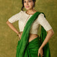 Elegant off-white chanderi blouse beautifully highlighted with delicate lace