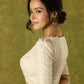Elegant off-white chanderi blouse beautifully highlighted with delicate lace
