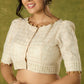 Elegant off-white chanderi blouse beautifully highlighted with delicate lace
