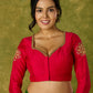 Elegant hand embroidered dark pink cotton silk blouse with intricate detailing.