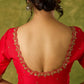 Festive hand embroidered red cotton silk blouse with elegant scallop detailing.