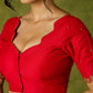 Festive hand embroidered red cotton silk blouse with elegant scallop detailing.