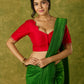 Festive hand embroidered red cotton silk blouse with elegant scallop detailing.