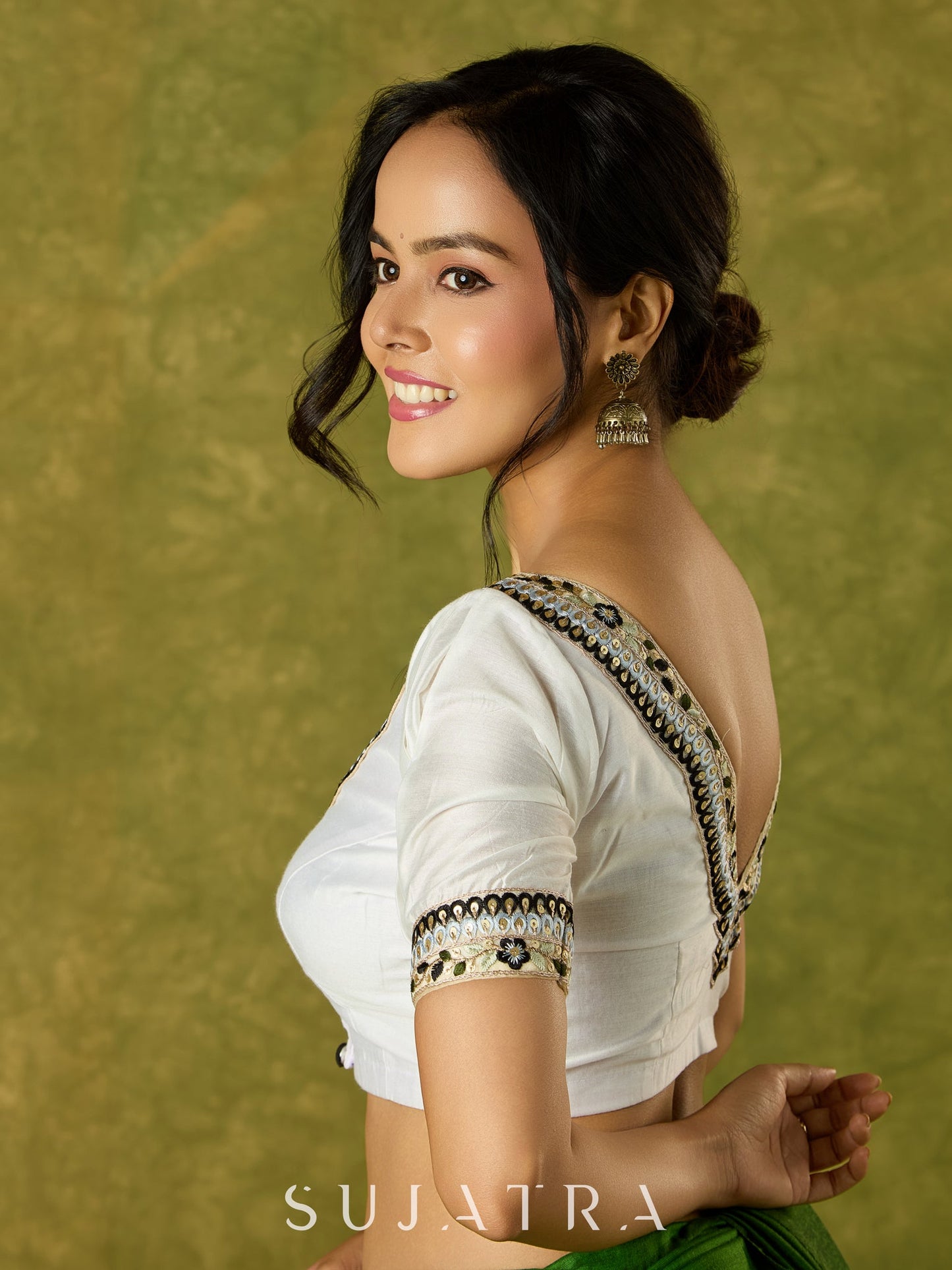 Elegant white Chanderi blouse with V-neck and lace highlights
