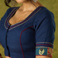 Beautifully hand embroidered navy blue blouse with stylish fabric combination.