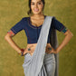 Beautifully hand embroidered navy blue blouse with stylish fabric combination.