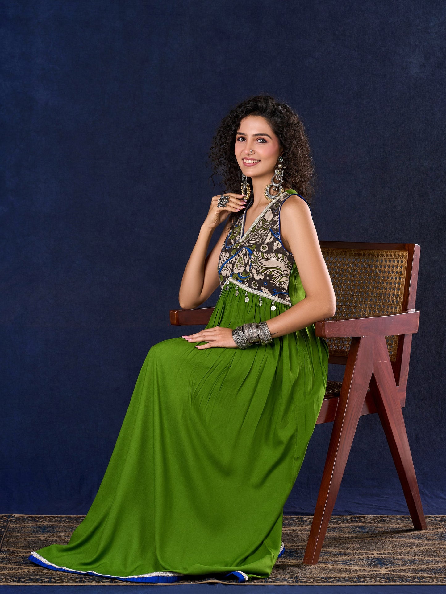Radiant flowy Moss Green and Blue Flared Gown with Kalamkari Yoke & Intricate Silver Accents