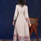 Artisanal Beige Handloom Cotton Angarkha Long Gown with Madhubani Border Embellished Neckline, Sleeve & Flare, with Vibrant Statement Tassels