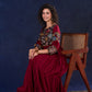 Timeless Maroon Rayon Layered Gown with Gathers and Hand Painted Kalamkari Accents featuring Puffy Sleeves and Delicate Golden Accents