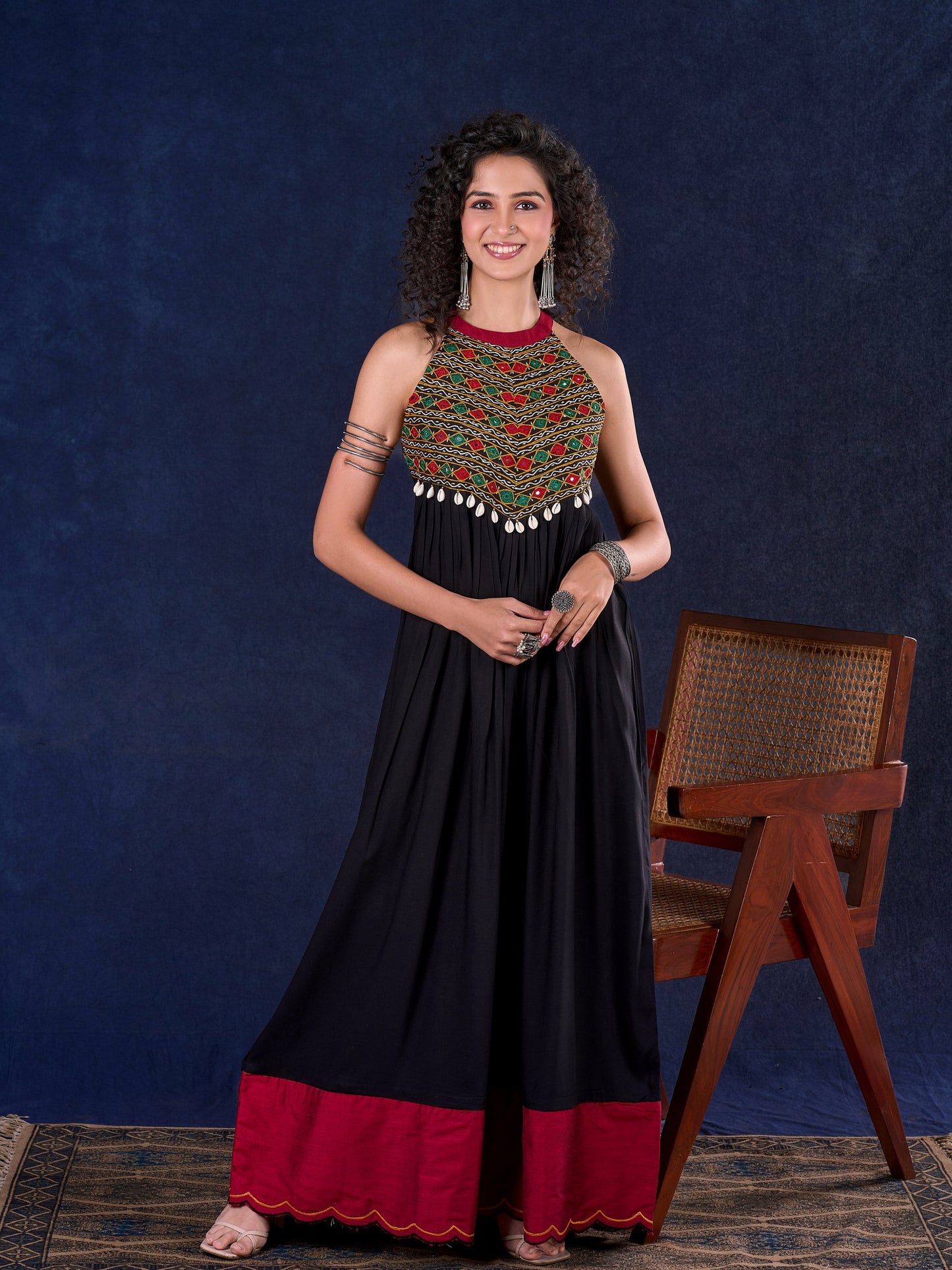 Elegant Black Rayon Halter Neck Long Gown with Mirror Work & Cowrie Shell Embellishments