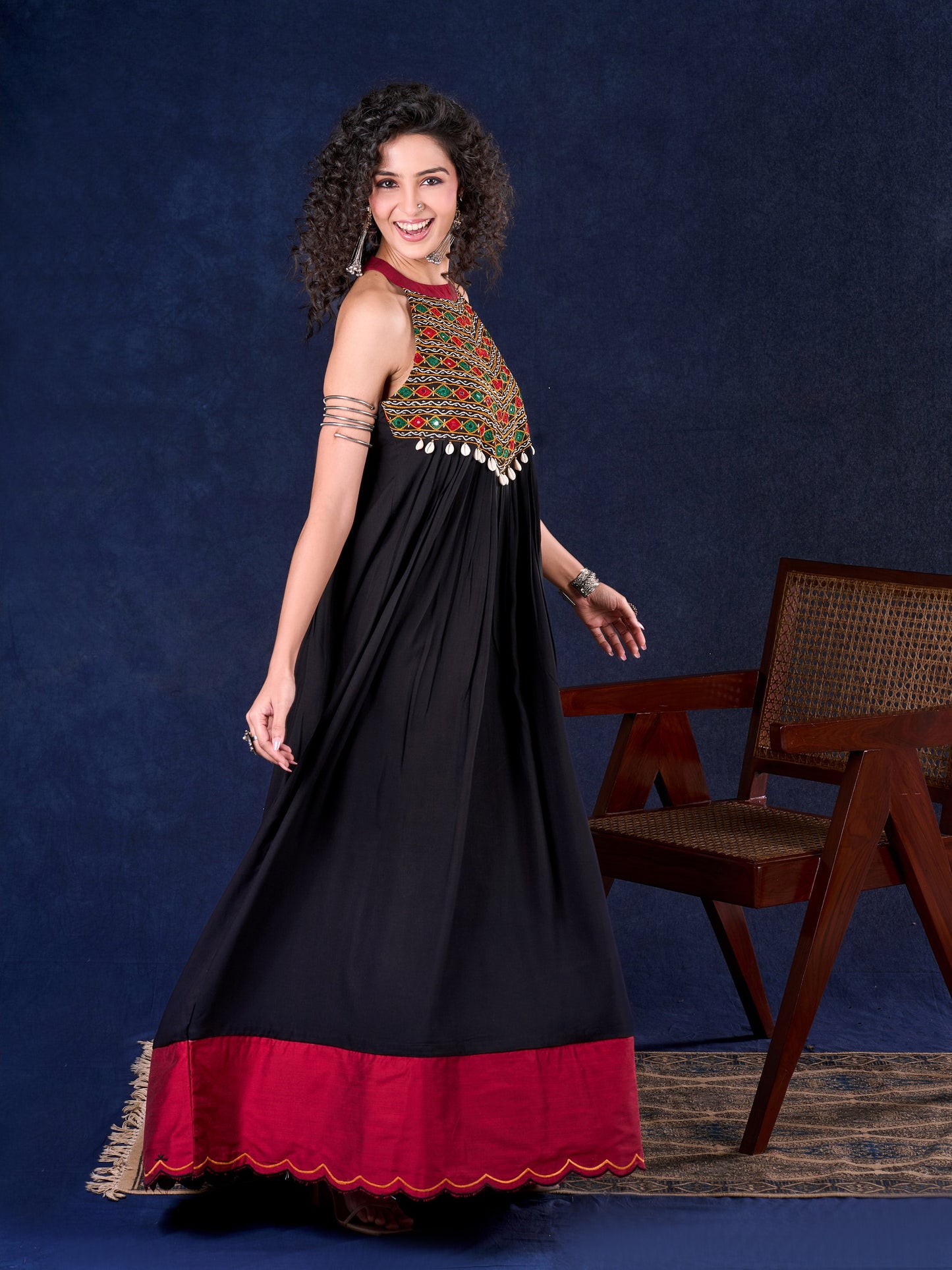 Elegant Black Rayon Halter Neck Long Gown with Mirror Work & Cowrie Shell Embellishments