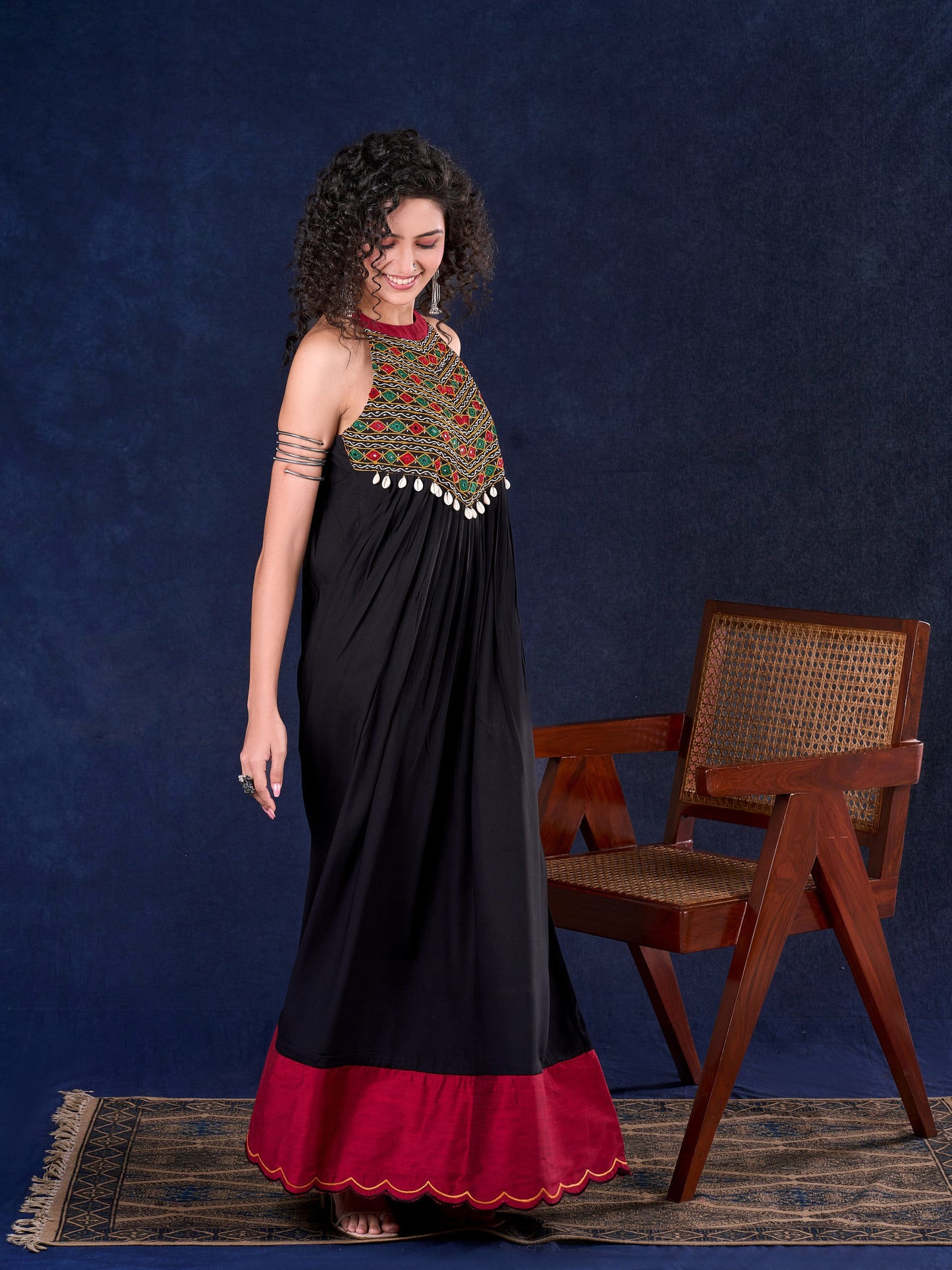 Elegant Black Rayon Halter Neck Long Gown with Mirror Work & Cowrie Shell Embellishments