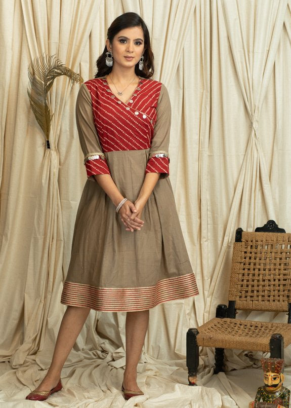 Exclusive beige dress with Bandhni print & coin embellishments
