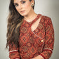 Rust Ajrakh printed dress with asymmetrical neckline & contrast detailing