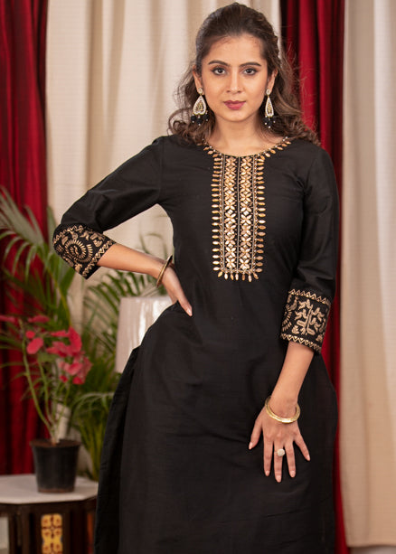 Straight Cut Black Cotton Silk Dress with Handmade Gotta Patti Work and Gold Foiled Warli Work on Sleeves