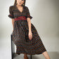 Exclusive black striped ikat dress with maroon waist Yoke