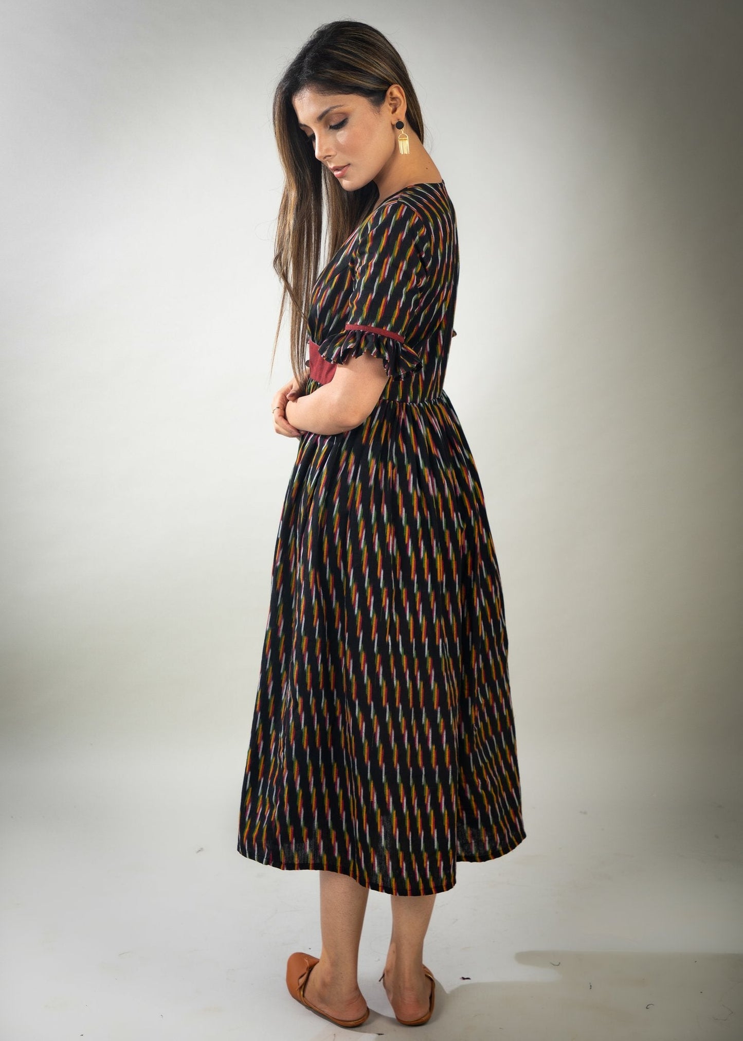 Exclusive black striped ikat dress with maroon waist Yoke