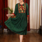 Forest green satin dress with exclusive embroidered yoke