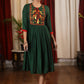 Forest green satin dress with exclusive embroidered yoke