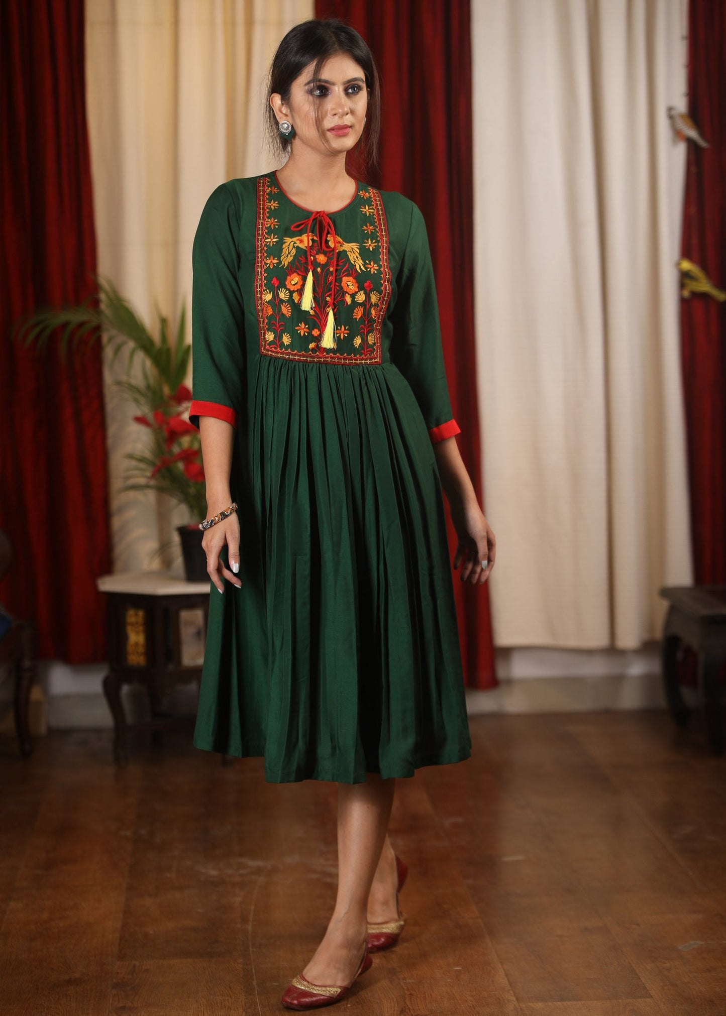 Forest green satin dress with exclusive embroidered yoke