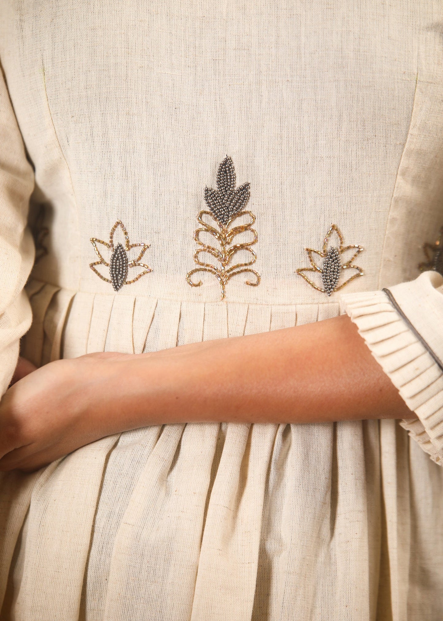 Off white flex cotton dress with hand embroidered zardosi work