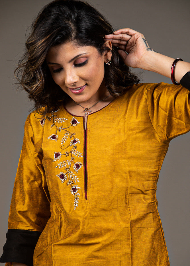 Exclusive mustard cotton top with hand embroidered zardosi embroidery