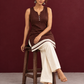 Timeless Brown Cotton Sleeveless Tunic with Notched V-Neck Button Placket & Contrast Lace Hem Border — seated