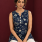 Navy Blue Batik Print Cotton Tunic with Ivory Lace Hemline & Mother-of-Pearl Button Placket — seated detail