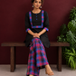 Timeless Black Cotton Kurta with Contrast Checkered Yoke Panel — seated