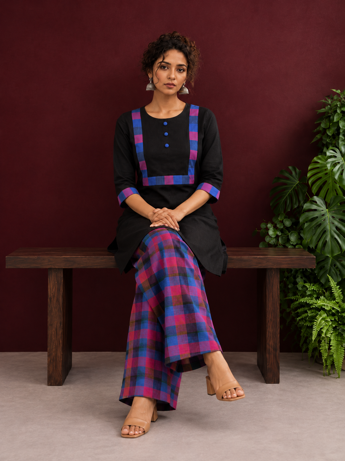 Timeless Black Cotton Kurta with Contrast Checkered Yoke Panel — seated