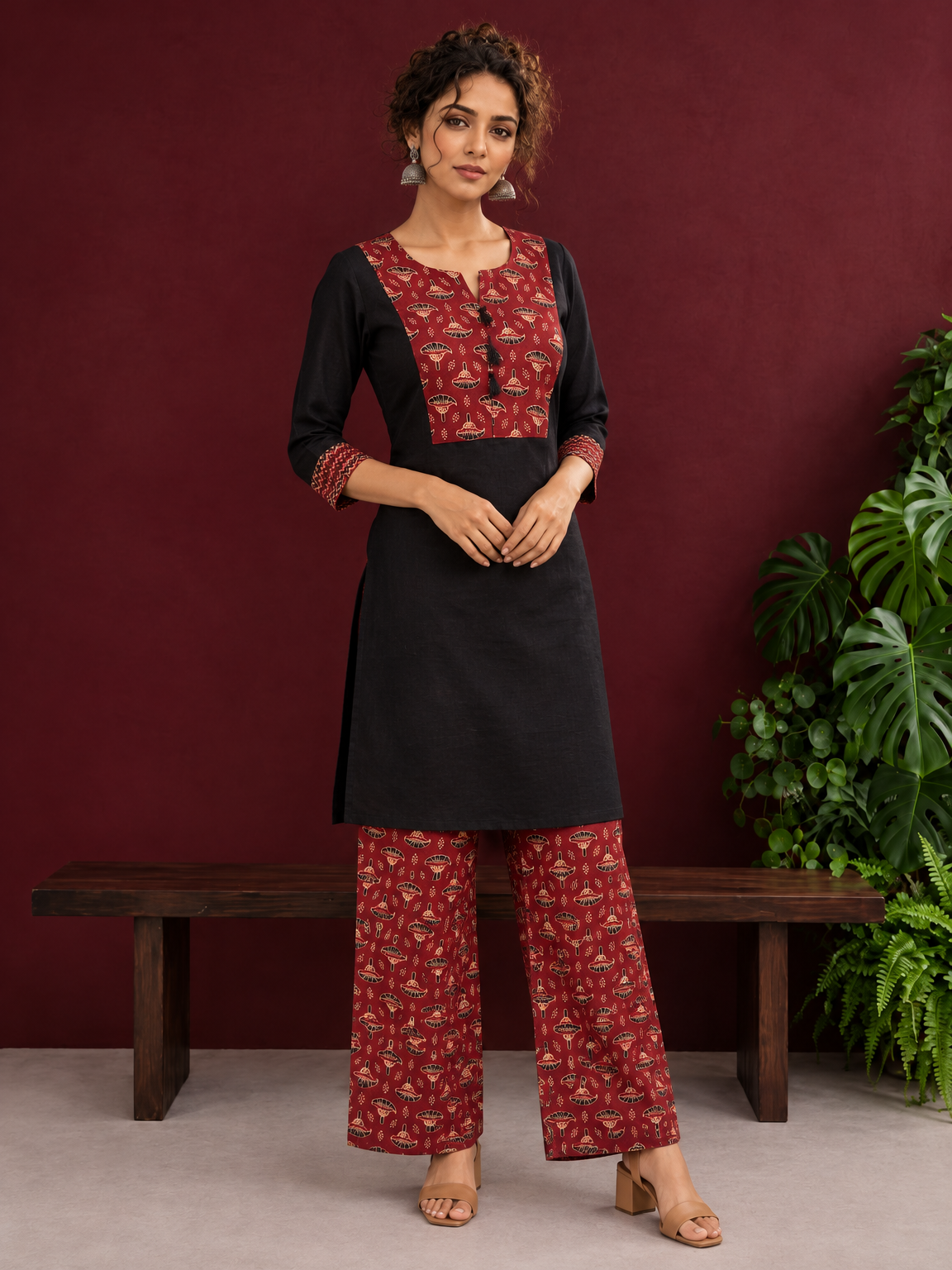 Classic Black Cotton Kurta with Maroon Ajrakh Print Yoke & Coordinated Sleeve Cuffs — front view