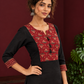 Classic Black Cotton Kurta with Maroon Ajrakh Print Yoke & Coordinated Sleeve Cuffs — styled view