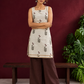 Off-White Cotton Kurta with Floral Leaf Block Print and Square Neck Contrast Trim — front view