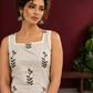 Off-White Cotton Kurta with Floral Leaf Block Print and Square Neck Contrast Trim — fabric detail