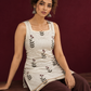 Off-White Cotton Kurta with Floral Leaf Block Print and Square Neck Contrast Trim — seated detail