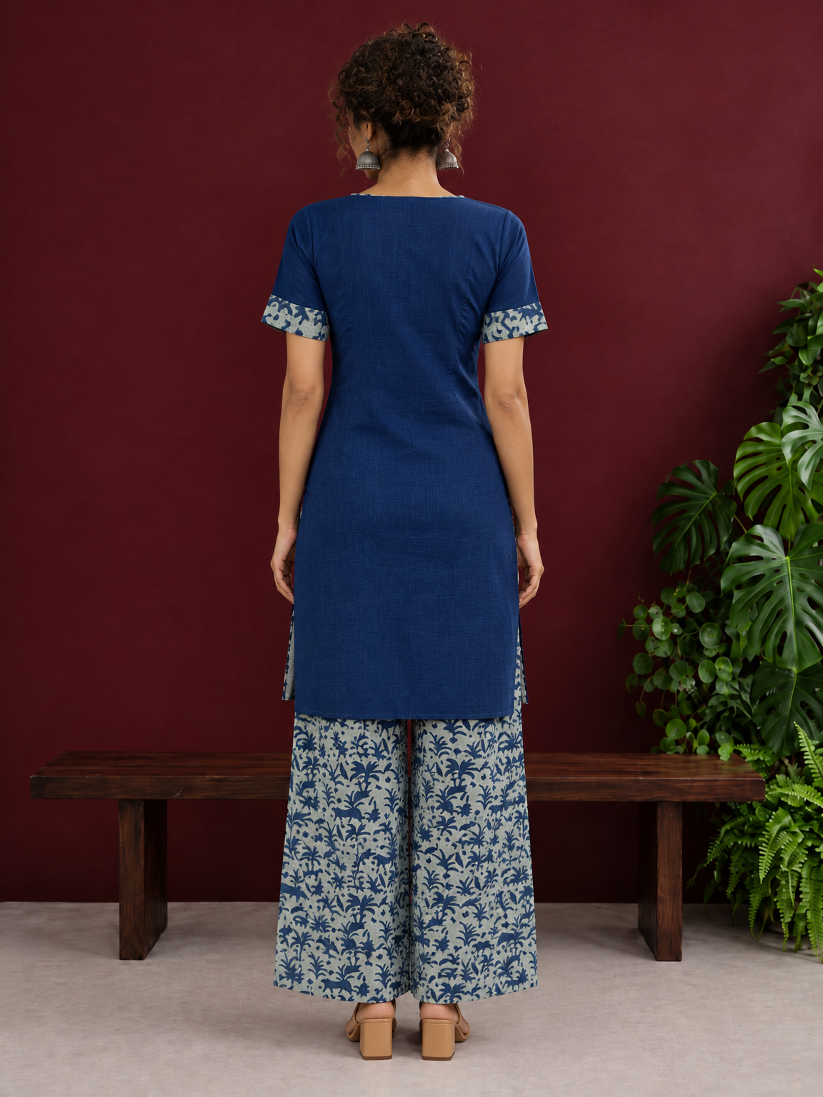 Navy Blue Cotton Kurta with Floral Printed Neckline and Sleeve Cuffs — back view