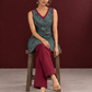 Teal Green Cotton Sleeveless Tunic with Floral Print, Maroon V-Neck Trim & Side Tie-Up Knots — seated