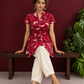 Elegant Maroon Cotton Tunic with White Leaf Print — seated